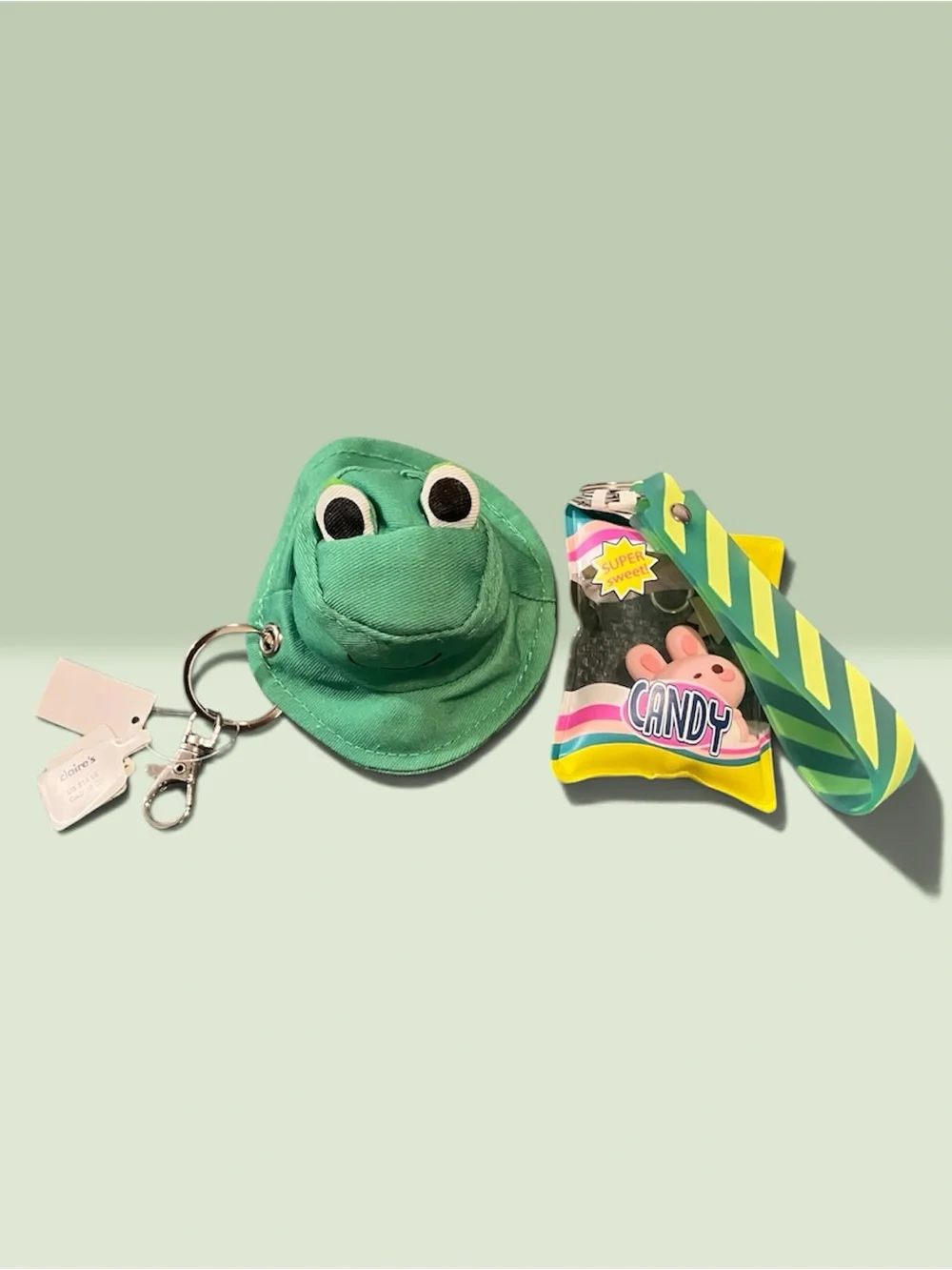 Claire's Green Frog Plush Keychain with Yellow-Striped Tag